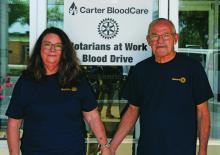 Les and Sherry Strickland stand in front of a Carter Blood-Care van in which Les put signage on to make residents aware of the Battle of the Badges Blood Drive going on at Texas State Technical College last week. The Stricklands have been very involved in the community for many years. Photo/Alex Kielar