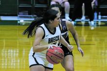 Analia Palacios moves around a Throckmorton Lady Greyhound defender during a game earlier in the season. Photo/Kylie Bailey