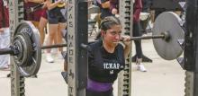 BHS junior Bianca Gotschall competing in the squat lift at the Buckaroo Bash powerlifting meet Thursday, Jan. 30. Gotschall earned a third-place finish in her weight class with a 250-pound squat. Photo/Contributed