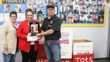 Beaty presents plaque to Walmart for 25 years of continued support