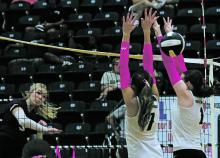 Lady Bucks Kamden Tidwell and Zia Gravitt jump to block Friday, Oct. 25 during the team’s loss to Millsap. The Lady Bucks fell 3-2 to the Lady Horns. Photo/Kylie Bailey