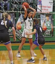 Lady Bucks senior Ruthie Valdez, who recorded three points and three rebounds, works in the corner against Peaster’s Londyn Wakeman. Photo/Alex Kielar