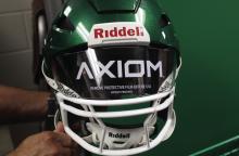 Upperclassmen of the Bucks football team will be utilizing these new Riddell Axiom helmets in the upcoming season, which create a personalized fit for each athlete and help improve safety. Photo/Alex Kielar
