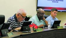 Mayor Bob Sims, far left, and Commissioners Rob Durham and Blake Hamilton during a December meeting. Photo/Stevie Watkins