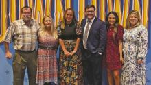 Pictured (L-R): David Stowe, Lisa Stowe, Neri Gonzalez, Breckenridge Economic Development Corporation Executive Director David Miller, Myia Jackson and Katherine Parker Post are all smiles after accepting the award Tuesday, Oct. 29 at the Texas Downtown President’s Award Gala.