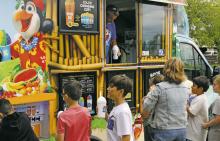 Students from South Elementary School were treated to snow cones Friday, April 28 to congratulate all students for working hard on this year’s STAAR test. Each student was able to get snow cones and a variety of flavors to choose from due to $500 in donations. Photo/Kaci Funderburg