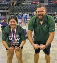 Maria Duran celebrates with head coach Jarrod Shepperd after she medaled at the state powerlifting meet Thursday, March 13, as she placed fifth in the 198-pound weight class. Duran was the lone medal of the eight lifters for the Lady Bucks. Contributed photo