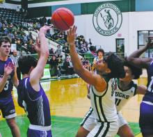 Jaimie Cruz fights for possession of the ball in the second half of the Buckaroos 56-46 loss to Tolar. Cruz was the leading scorer for the Bucks with nine points Tuesday, Feb. 11. Photo/Alex Kielar