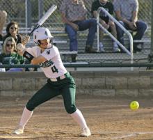 Aurrin Matheson watches a pitch during a game earlier this season. Matheson recorded one hit in a 9-1 loss Friday, April 4 to the Eastland Lady Mavericks in which three other Lady Bucks had hits. Photo/Alex Kielar