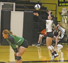 Jesi Warren (right) had five kills for the Large School East All-Stars during Saturday’s Oil Bowl volleyball match at Rider Fieldhouse. Photo/Mike Williams