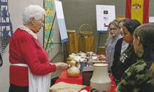 Breckenridge Junior High School students take a look at some of the notable artifacts from the early years of the Republic of Texas as part of the exhibit that will continue to be on display at the Fine Arts Center through Saturday, March 15. Photo/Alex Kielar