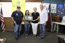 Breckenridge Fire Department Chief Malcom Bufkin and BFD secretary Christi Tidrow accept the Battle of the Badges award from Carter BloodCare representative Colleen Horan and Rotary Club of Breckenridge President JB Sparks during the club’s meeting Tuesday, Aug. 20.  Photo/Mike Williams