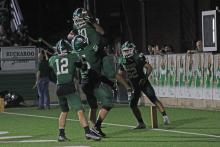 (Photo/Alex Kielar) Running back Jaime Cruz is lifted in the air by offensive lineman Brandon Niblett after Cruz ran it in for a touchdown against Cisco earlier this season. The Bucks open their district schedule up at Clyde this Friday, Oct. 10. 