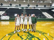 Buckaroos seniors Jackson Curtis (1), Karter Smalley (12), Camden Escalon (2) and Alexis Franco (5) were honored prior to the Bucks’ 67-35 senior night win Friday, Feb. 9 over Millsap. Photo/Mike Williams