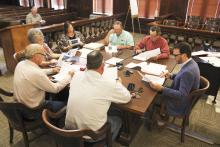County commissioners review a letter sent to Stephens County Judge Michael Roach regarding the Aircraft Detection Lighting System Tower planned for the La Casa Wind Farm project. Photo/Mike Williams