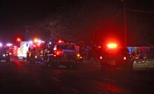 (Photo \ Alex Kielar) Local firefighters battled two fires Monday night, March 31, one in the 100 block of East Sixth Street and the other on County Road 206. One male suspect is in custody on arson charges for the one on East Sixth. 