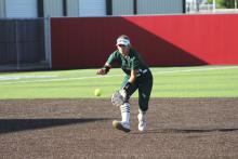 Carlee Stewart (shown fielding a ground ball) recorded RBIs on both of the Lady Bucks two runs in their 3-2 loss Monday, April 22 at Graham. Photo/TC Gordon (The Graham Leader)