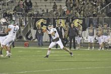 Buckaroos quarterback Cam Escalon finished the final game of his high school career with 111 passing yards and two touchdowns.  Photo/Mike Williams