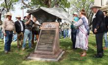 (Photo/Thomas Wallner) A plaque featuring the Col. William Barret Travis “Victory or Death” letter is unveiled during a ceremony held Tuesday, April 14 at the Stephens County Courthouse. The historic event also recognized 100 years of the Stephens County Courthouse.