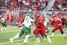 The Buckaroos struggled to move the ball offensively and against the pass defensively in their 64-0 loss Friday, Aug. 30 at Holliday. Photo/Mike Williams