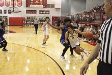 Camden Escalon drives past a defender during the fourth quarter of the Buckaroos' 75-50 loss to City View in the bi-district playoff Tuesday, Feb. 20 at Olney High School. Photo/Mike Williams