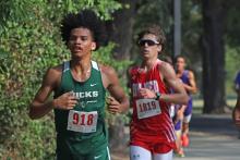 (Photo/Liam Bailey) Andrew White races in the three-mile run of the Brownwood Invitational in which he placed ninth overall to earn a top 20 medal Wednesday, Aug. 27. 