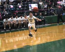 (Photo/Alex Kielar) Ryan Waller goes after a loose ball that is just out of his reach, summing up the Bucks’ being just out of reach of coming out with a victory Tuesday, Feb. 3 in thrilling district game at home against Dublin. 