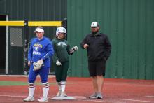 Mia Castillo receives a fist-bump following a single during the third inning of the Lady Bucks’ 9-5 win Friday at Brock. Photo/Mike Williams