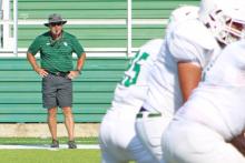 (Archive Photo) Buckaroos Head Football Coach Casey Pearce, on the sidelines during the 2024 Watermelon Scrimmage, has a personal connection to the 2004 film “Friday Night Lights” as he was part of the coaching staff of Odessa Permian during the filming of the movie. 