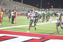 Brilee Bernel reaches across the end zone to end a 9-yard pass with a touchdown during the second quarter of the Buckaroos’ 36-28 win over Benbrook on Friday, Sept. 22 Photo/Mike Williams
