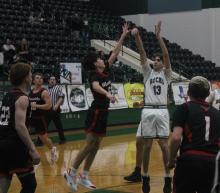 (Photo/Alex Kielar) Bry Armstrong shoots a mid range jumper from the free throw line in the first half Thursday, Jan. 29 of the Bucks’ 72-16 trouncing of the Eastland Mavericks.