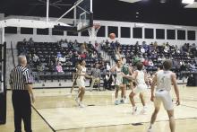 Jackson Curtis (1) scored 11 points for the Buckaroos during their 46-43 district-opening win Tuesday, Dec. 19 against the Indians at Comanche. The Buckaroos travel to Eula next week. Photo/Mike Williams