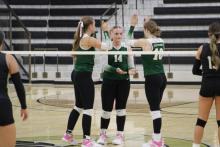 Joni Jackson (middle) has proven she can be a threat at the volleyball net this season. She had five kills and four blocks Friday, Sept. 13 at Comanche. Photo/Mike Williams