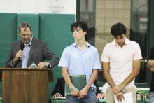 Jaxon Escalon (middle) was awarded the Fighting Heart award by baseball coach Jeremy West during the All-Sports Banquet held Thursday, May 16. Photo/Mike Williams