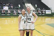 Lady Bucks seniors Mia Castillo (2) and Zaea Ragle (23) were honored before the Lady Bucks’ 60-28 win Tuesday, Feb. 6 at Breckenridge High School. Photo/Mike Williams