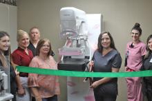 (Photo/Alex Kielar) Stephens Memorial Hospital staff and the Breckenridge Chamber of Commerce celebrate the ribbon cutting for the hospital’s new Fujifilm Aspire Cristalle 3D mammography machine in May. The hospital’s radiology department was recently awarded a three-year accreditation in mammography. 