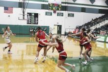 Mia Castillo drives to the basket during the first quarter of the Lady Bucks’ home loss to Eastland. She finished the game with eight points.  Photo/Mike Williams