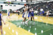 Analia Palacios (with ball) scored six points for the Lady Buckaroos Friday, Jan. 19 during their home loss to Brock.  Photo/Mike Williams