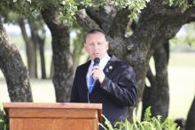 Brian Pollock, senior warden of the Texas Department of Criminal Justice’s Walker Sayle Unit gives open remarks during a ceremony dedicated to fallen officers Thursday, May 9. Photo/Mike Williams