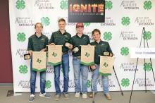 Stephens County 4-H students Aiden Boulevard, Josiah Moreno, Kason Burchett and Isaac Tait, from left to right, earned a pair of state titles as a team in both Range and Pasture Grass Identification and Range Evaluation contests June 3-6 at the Texas 4-H Roundup in College Station. The team was coached by Jerry Corbett. Contributed photo/Jessie Shortes