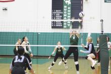 Lady Bucks senior outside hitter Miley Roberts attempts to block a swing made by an Abilene Christian hitter during the first set of the Lady Bucks’ 2-1 loss Thursday, Aug. 15 to the Lady Panthers. Photo/Mike Williams
