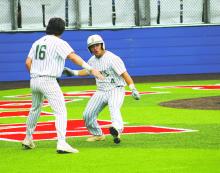 Christian Arellano (16) congratulates Ashton Reyes after scoring a run during the first inning Friday, May 3 against Jacksboro. Photos/Mike Williams