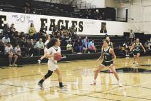 Karsyn Smalley (1) guards a Lady Eagle in a full-court press during the Lady Bucks 57-31 loss Tuesday, Nov. 7 at Abilene High School. Photo/Mike Williams