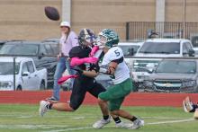 (Photo/Alex Kielar) Cooper Wimberley battles through tight coverage in the end zone before coming down with the catch for the go-ahead score with under a minute remaining in the Bucks’ thrilling 26-22 win over Comanche. 