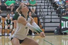 (Photo/Alex Kielar) Isabelle Biddison digs the ball during the Lady Bucks opening set of their non-district loss to Iowa Park on the road Tuesday, Aug, 19. Biddison recorded six successful bumps overall. 