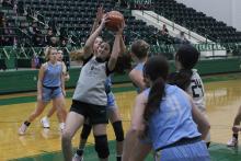 (Photo/Alex Kielar) Paisley Thibodeaux drives to the hoop against Huckabay in the paint during the Lady Bucks’ opening scrimmage Saturday, Nov. 1. 