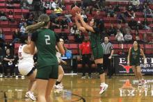 (Photo/Alex Kielar) Paisley Thibodeaux puts up a three-point shot attempt in the Lady Bucks’ game at Eastland for their final game before the Christmas break in a loss. 