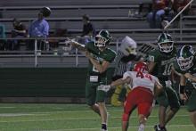 (Photo/Alex Kielar) Hudson Woodward attempts a creen pass to the right side of the field during the Bucks’ opening game against Holliday at Buckaroo Stadium Friday, Aug. 29. The Bucks continued to roll with a three-quarterback system with all three getting looks during the game. 