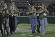 (Photo/Alex Kielar) Rylee Fuller, right, marches out with the rest of the Pride of Breckenridge High School Band Friday, Aug. 29 as the first halftime show of the year commences. Fuller was selected to represent Breckenridge FFA at the National FFA Convention & Expo in Indianapolis, where she will perform on trumpet. 
