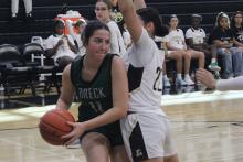 (Photo/Alex Kielar) Paisley Thibodeaux fights against Mackenzie Baker in the paint during the Lady Bucks’ opening game 39-36 win Saturday, Nov. 8 over Abilene High. 
